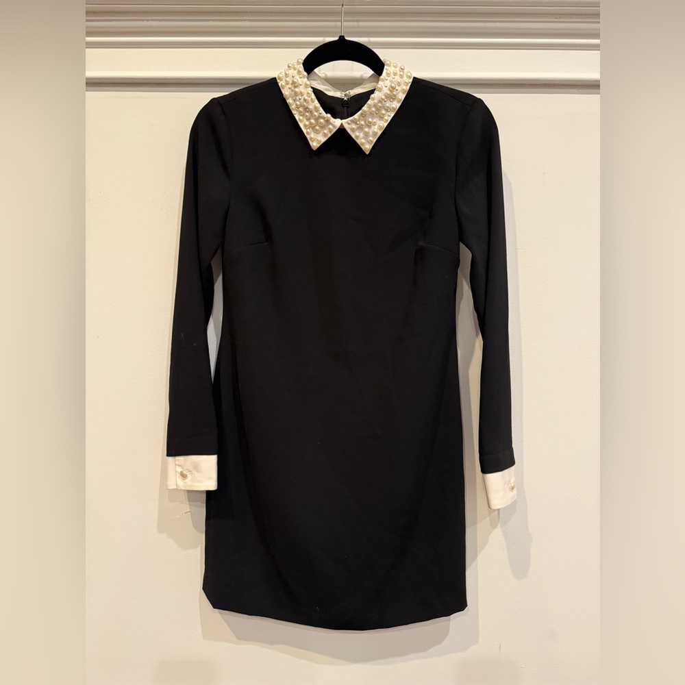 Elegant Black Dress with Pearl Collar